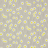 Little Greene bloemenbehang met margrietjes die dansen over het behang met een beige klei kleurige achtergrond
